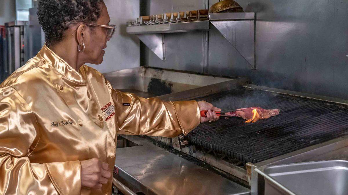 Gayle Dudley, a grill master at the LongHorn Steakhouse in Columbus, 3201 Macon Road, has grilled over 1 million steaks during her more than 25 years of working for the national restaurant chain.