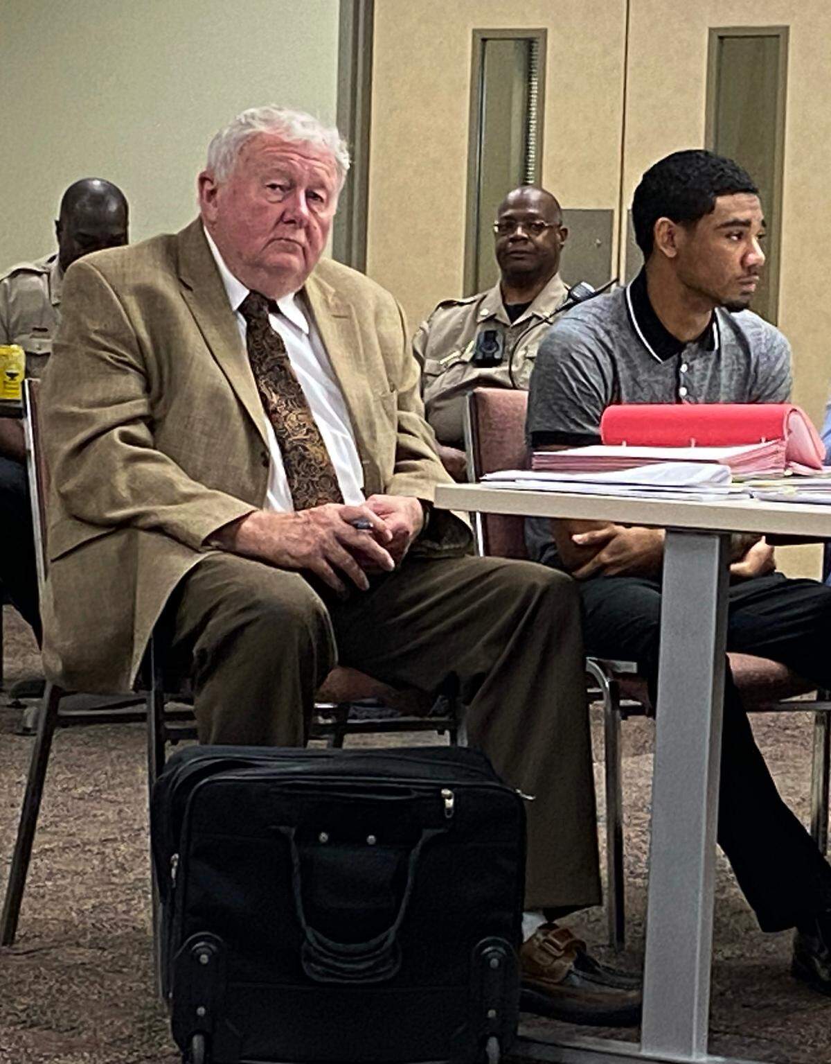 Defense attorney Michael Garner, left, is representing Zajaliq Stpaul Riley, right. Riley is accused of killing 20-year-old Devion Miley on May 8, 2021. 08/07/2023