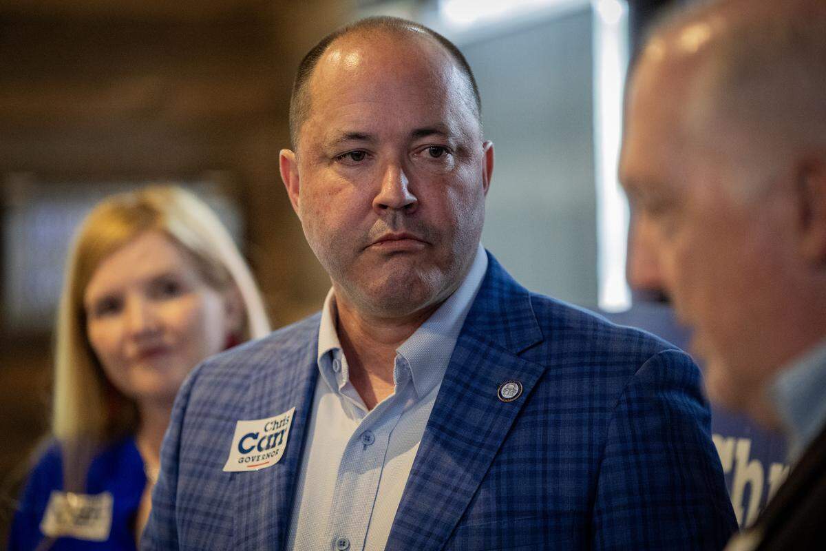 Georgia Attorney General and Republican gubernatorial candidate Chris Carr and his wife, Joan, make a campaign stop May 13, 2026, in Columbus at The Office Sports Bar & Grill.