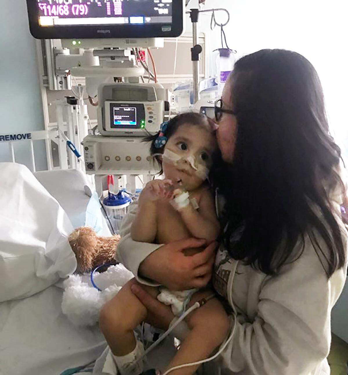 Guadalupe Marin holds her daughter Sofia.