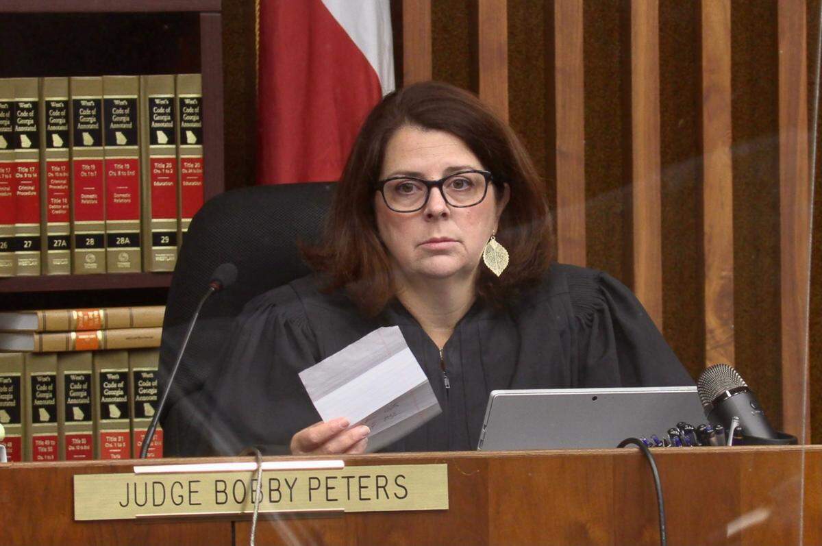 Visiting Judge Katherine Lumsden receives a note from the jury in the misconduct trial of suspended District Attorney Mark Jones, on Nov. 12, 2021.