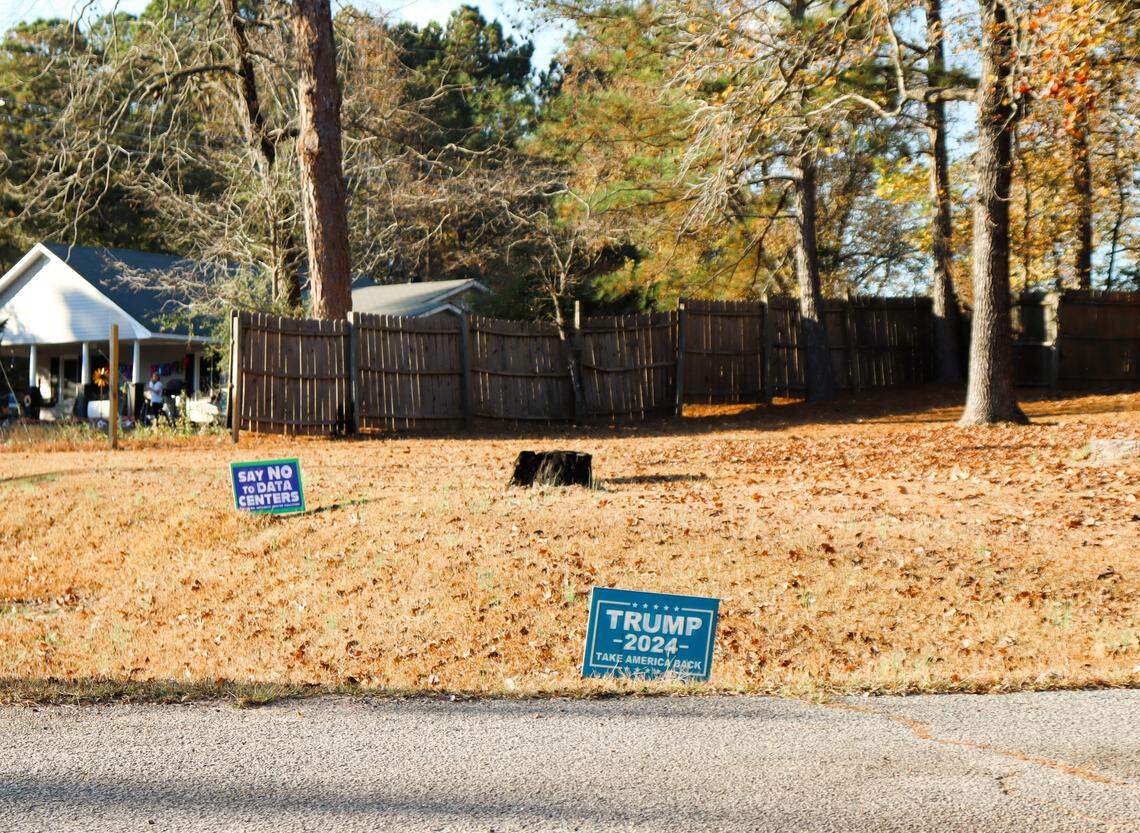  A“Trump 2024” sign and a “Say No to Data Centers” sign in the front yard of a residence near Hightower Road in Hogansville