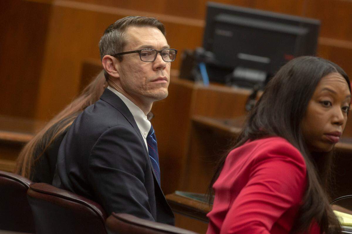 Suspended District Attorney Mark Jones and his defense attorney Katonga Wright on day four of the misconduct trial against him on Nov. 11, 2021, in Columbus, Ga.