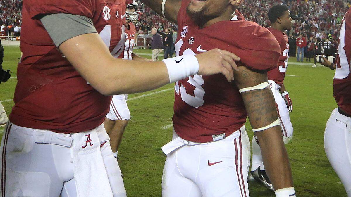 JOHN BAZEMORE/Associated PressAlabama quarterback Jake Coker, left, celebrates with Alabama wide receiver ArDarius Stewart after the game Saturday against LSU in Tuscaloosa, Ala. Alabama won 30-16.