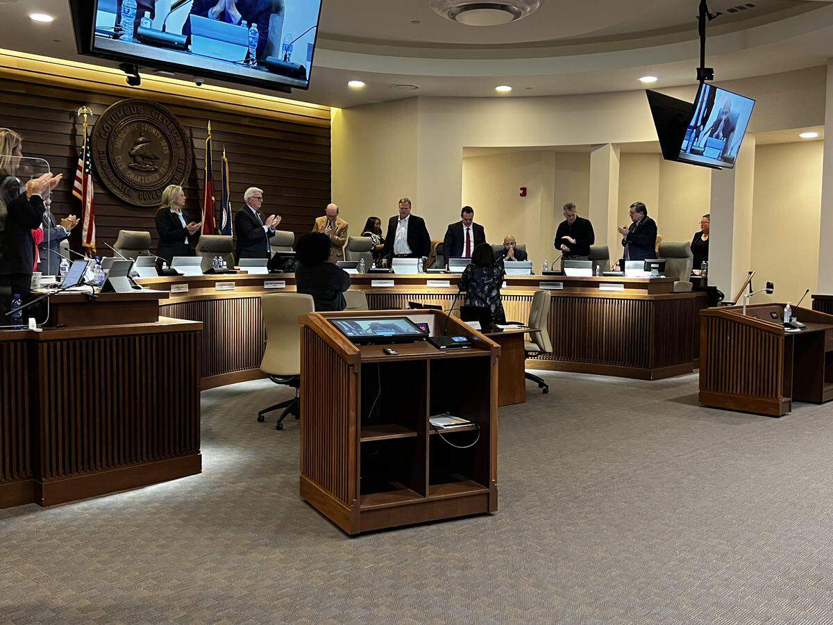 Columbus Mayor Skip Henderson, the Columbus Council and city staff give a standing ovation to Columbus Councilor Bruce Huff after he announced during the Jan. 27, 2026, council meeting he will not seek reelection.