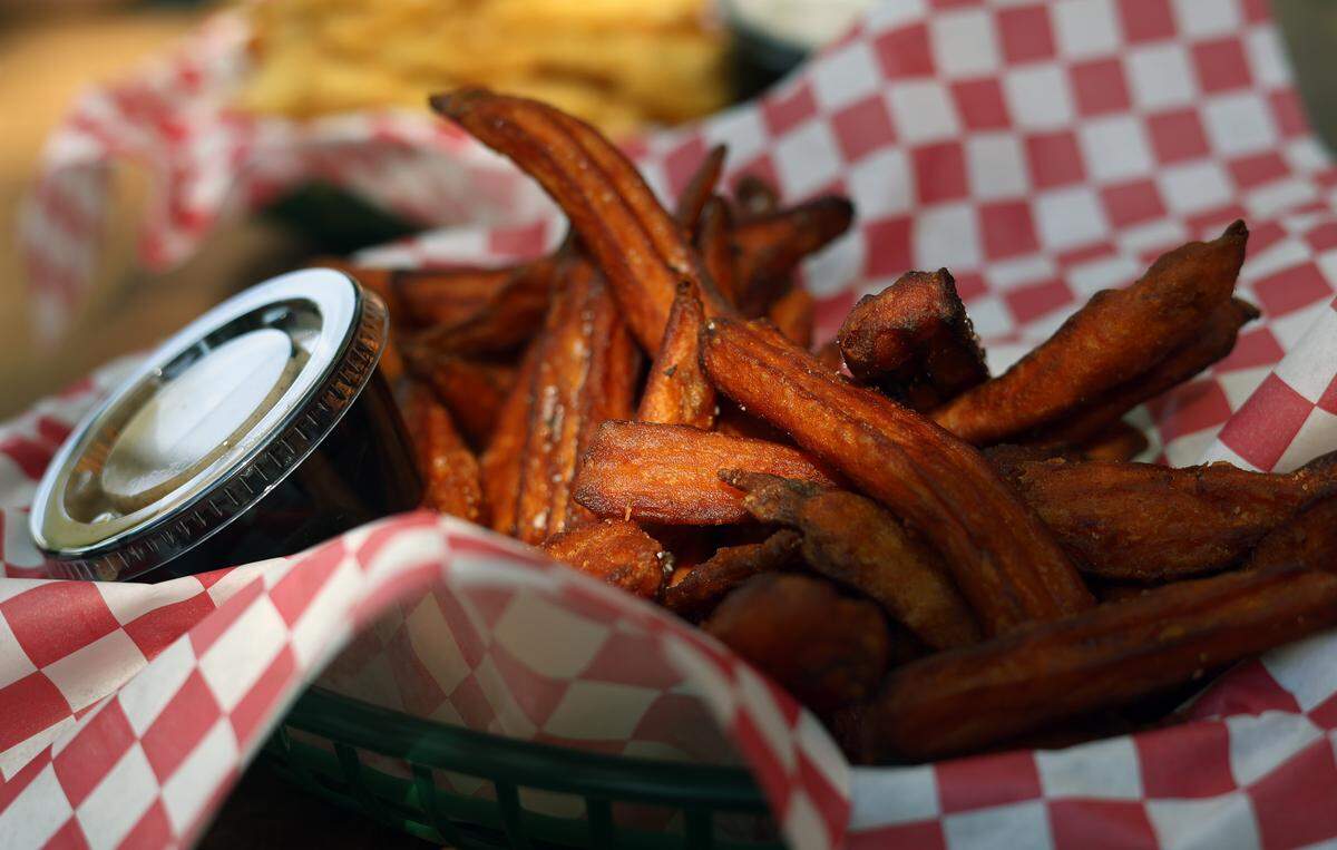 Ledger-Enquirer reporter Kelby Hutchison also ordered the sweet potato fries at The Mix Market in Columbus on Nov. 6, 2025.. They came with a cinnamon glaze dip.