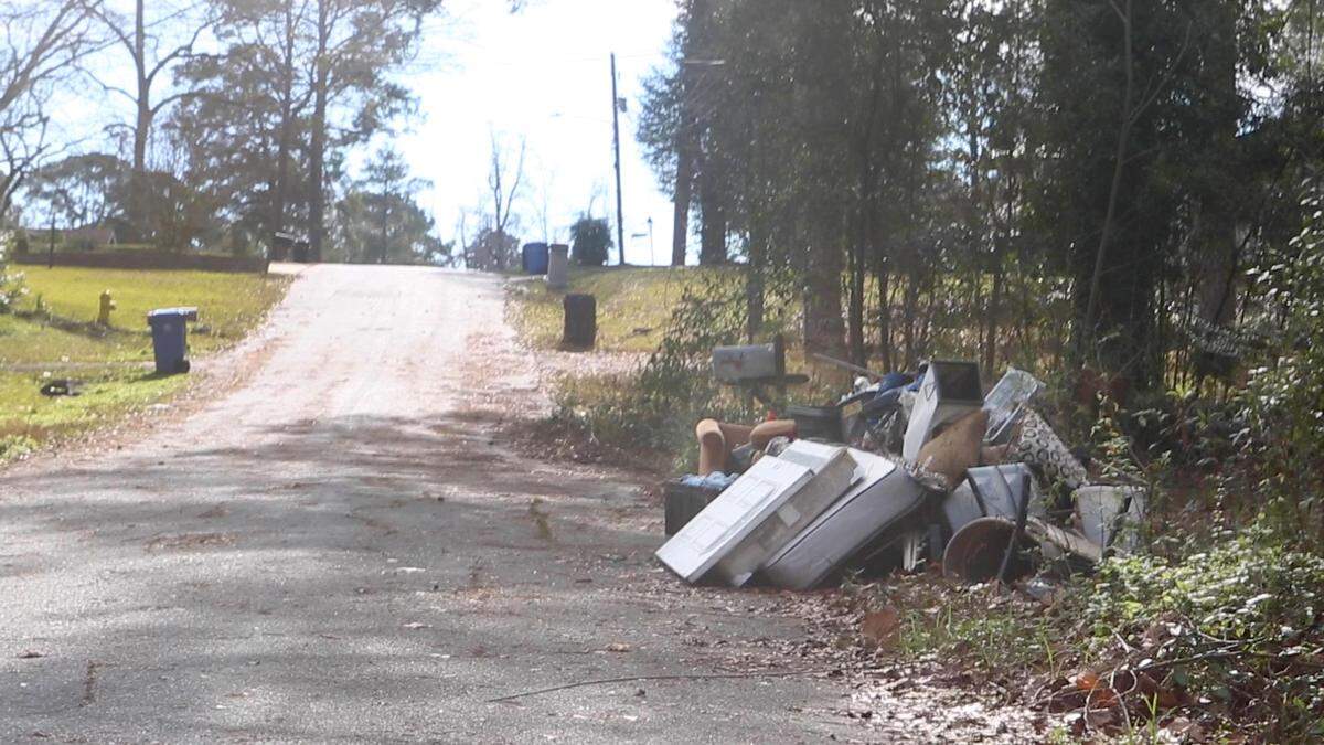 Trash gathers in a residential area on Grant Rd. in Columbus, Ga. on Jan. 7, 2022.
