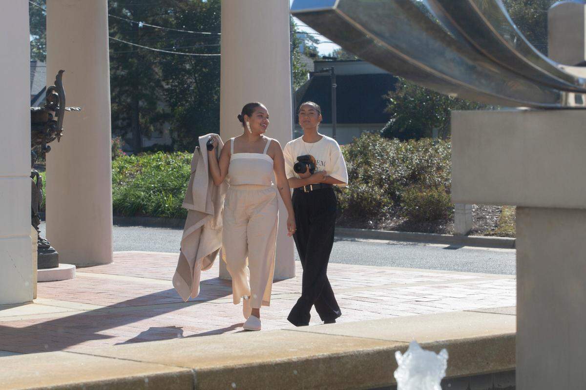 Content creators Sydnie Haag and Mailee Barkdull collaborate on a brand shoot at the Columbus Museum on Nov. 1, 2021.