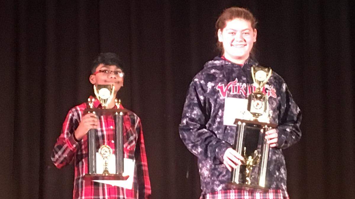 Two students from Columbus qualified for the 2019 Georgia Spelling Bee by finishing first and second Saturday in the Region 6 competition at Fort Valley State University. St. Anne Pacelli-Catholic School eighth-grader Elizabeth Turner, right, was the winner, and Reese Road Leadership Academy fifth-grader Ryan Tadiparthi was the runner-up.