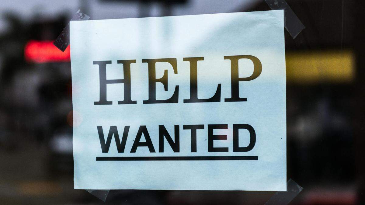 https://www.pexels.com/photo/help-wanted-sign-on-glass-5737622/