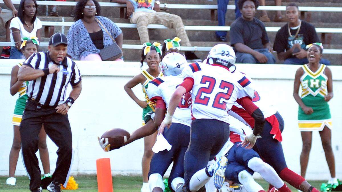 Spencer's Ervin Davis breaking the plane of the goal line with the football for Spencer's 2nd touchdown of the night against Northside