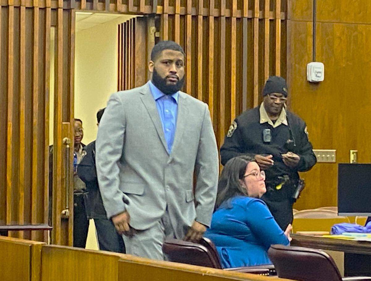Ruben “Rich” Hensley re-enters the courtroom after a break in his Columbus murder trial in the fatal 2021 shooting of his friend Marjester “Marty” Thornton.
