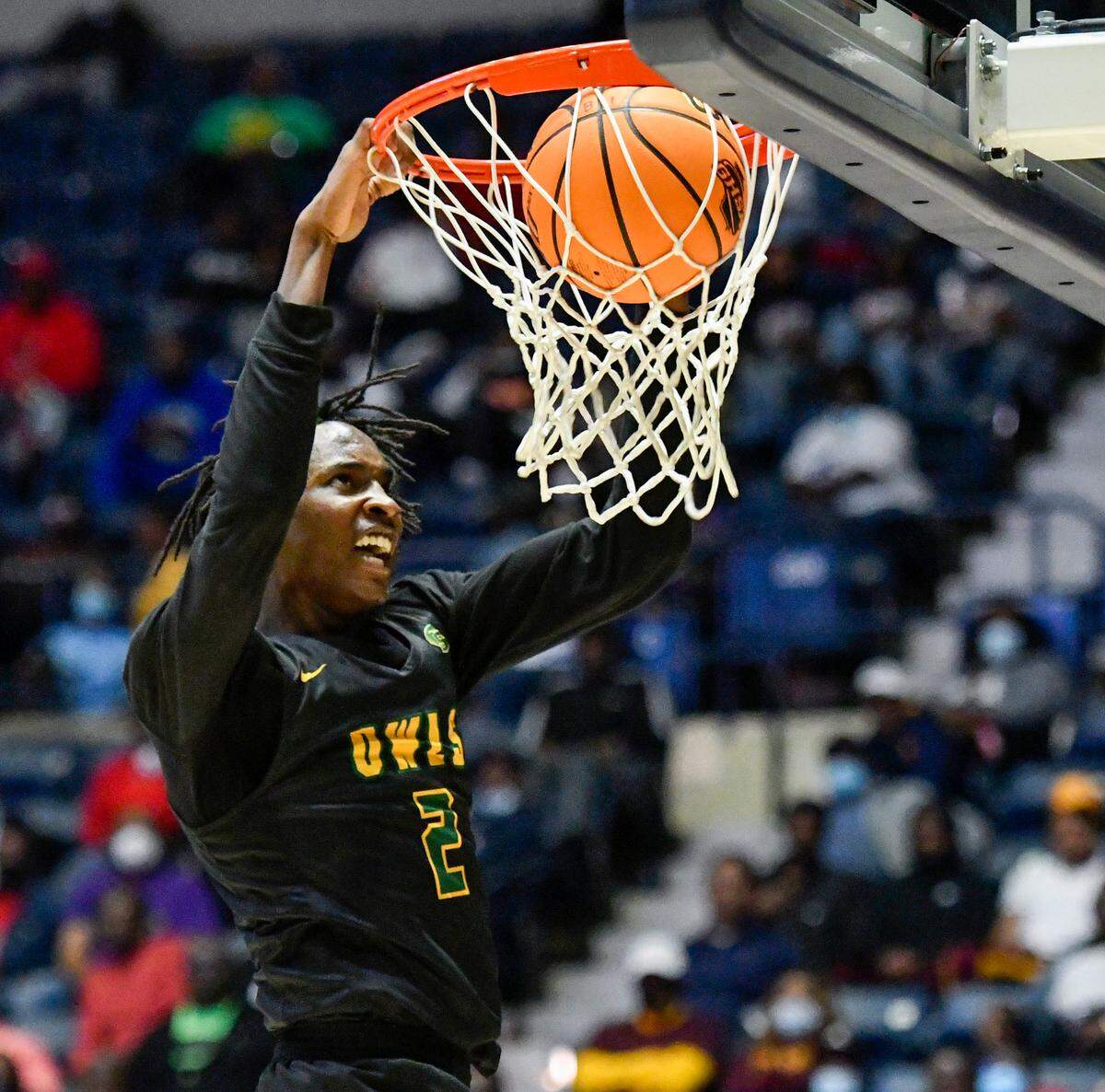 Spencer’s Tycen Mcdaniels (2) dunks the ball during the Greenwave’s GHSA 4A State Championship game against Westover Wednesday in Macon.