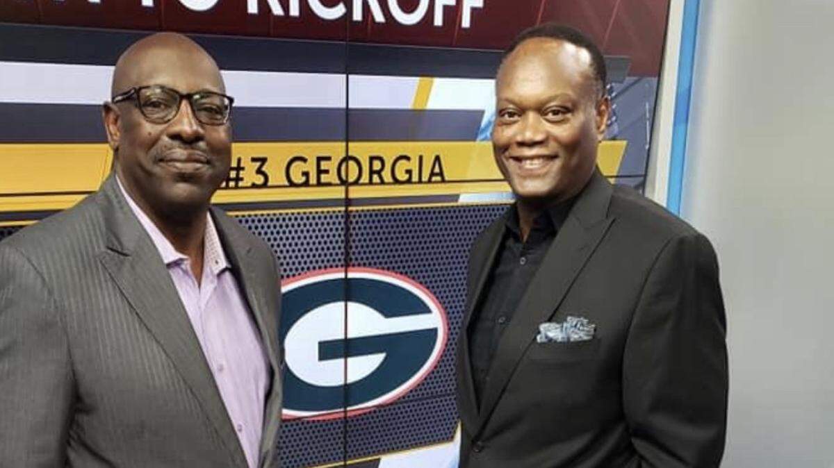 Columbus natives and former Georgia football players Dale Williams, left, and DJ Jones, helped the Bulldogs win the 1980 national championship. They are partners in Sportsvisions, a multimedia sports marketing company.