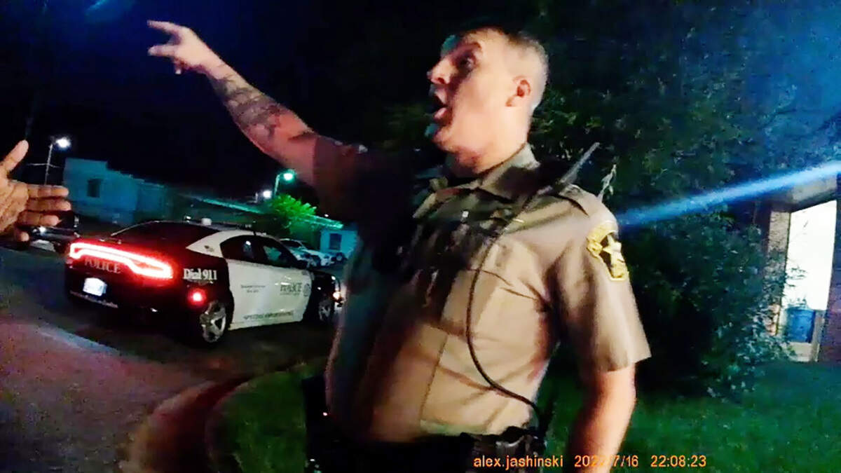 Deputy Blaine Adkins with the Muscogee County Sheriff’s Office yells at Columbus Police Officers outside the Muscogee County Jail on July 16, 2022. 07/16/2022