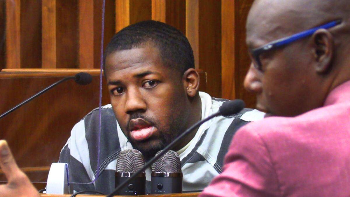 Stacey Jackson. the defense attorney for Tommie Jamal Mullins Jr., 28, questions Eric Randall Spencer Jr.(facing camera) Wednesday morning. 03/30/2022