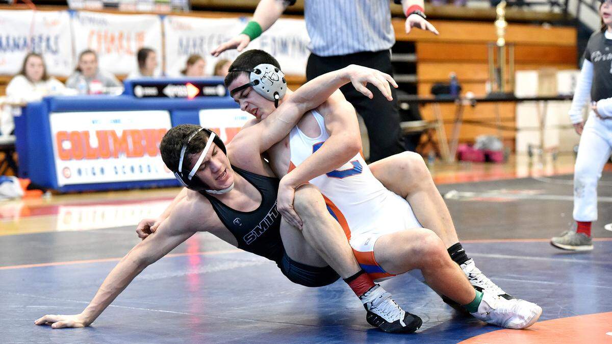 Smiths Station’s Anthony Dunn and Columbus’ Ryan Bithorn compete in the 152-pound weight class final round during the city wrestling championships at Columbus High School on Saturday January 26, 2019.