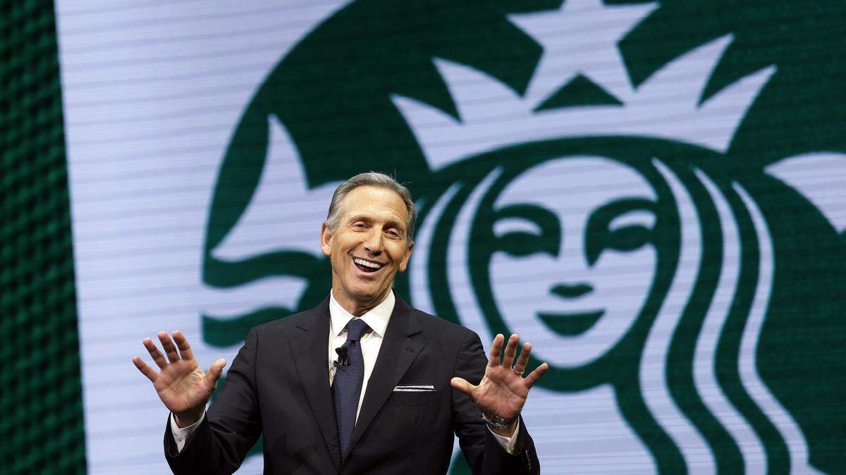 Starbucks CEO Howard Schultz speaks at the Starbucks annual shareholders meeting in Seattle in this file photo.