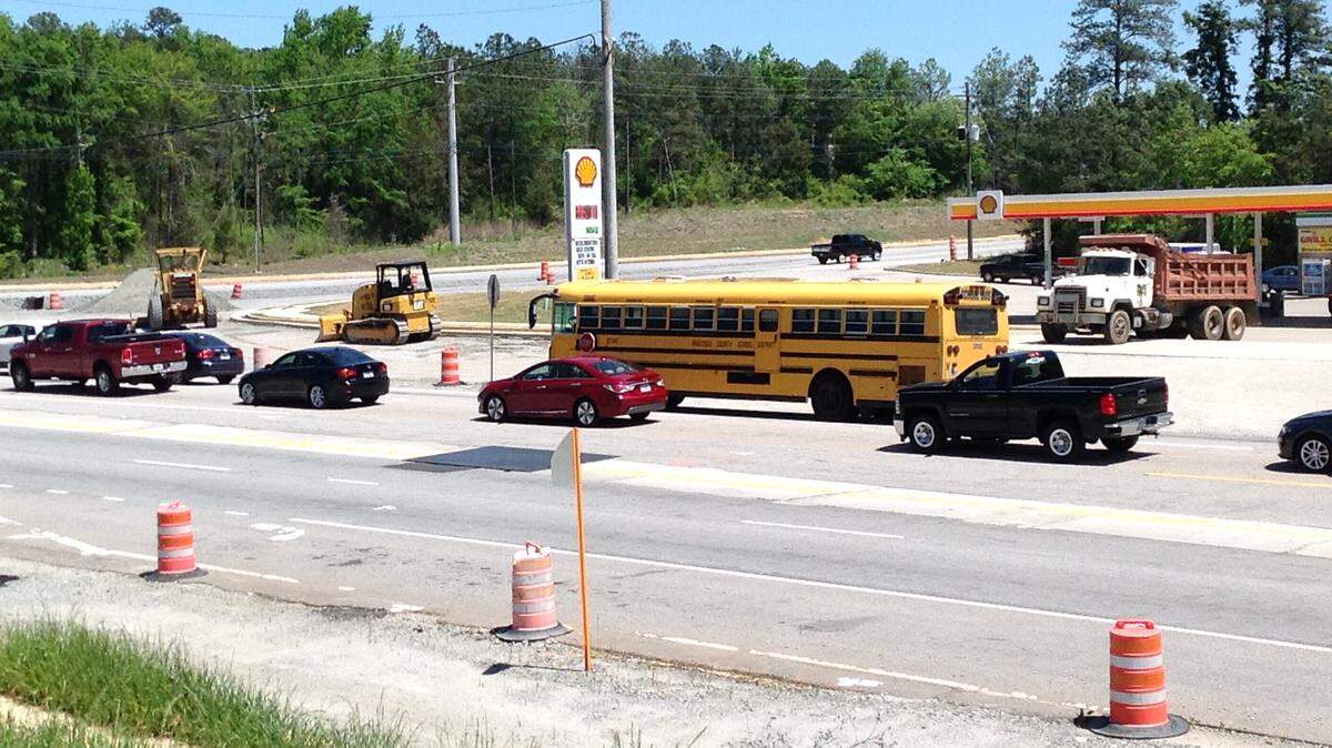 Motorists along a portion of Veterans Parkway, between Old Moon Road and Hancock Road, can expect more traffic delays and congestion from the road-widening project that was started in 2014. This file photo shows Veterans Parkway near Moon Road. --