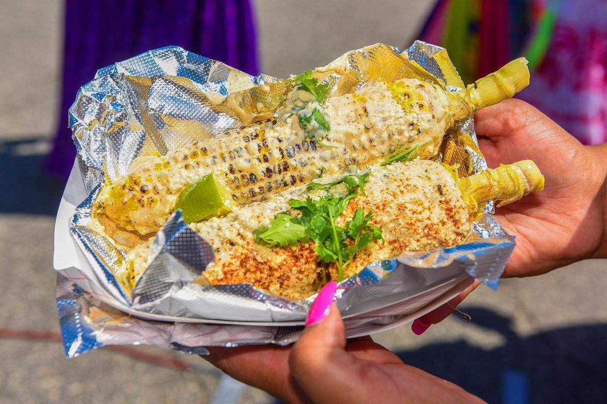 Mexican Street Corn, served by many food vendors at the Tri-City Latino Festival on Saturday afternoon, was a crowd favorite. 09/21/2024