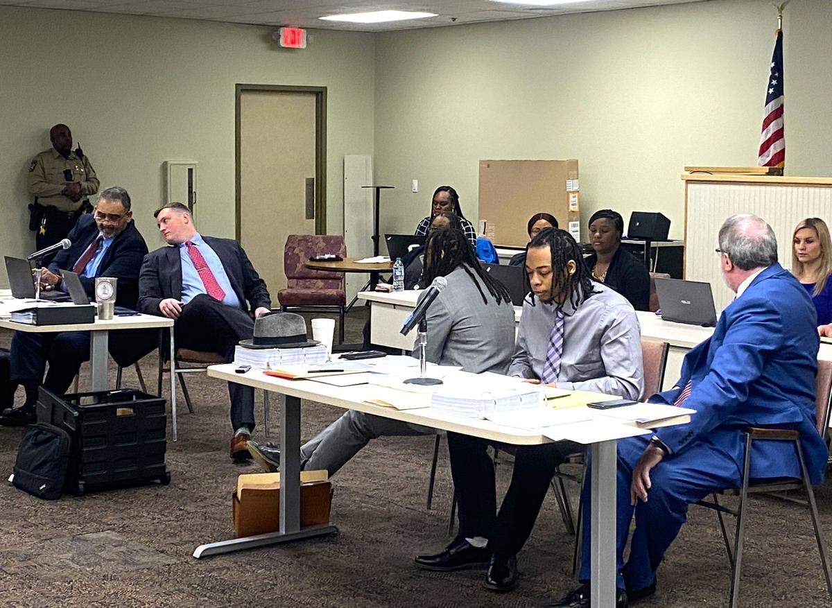 Seated left to right in the foreground are prosecutors Ray Daniel and Austin Hammock, and defense attorney William Kendrick, defendant Deante Caruthers, and attorney Mark Shelnutt.