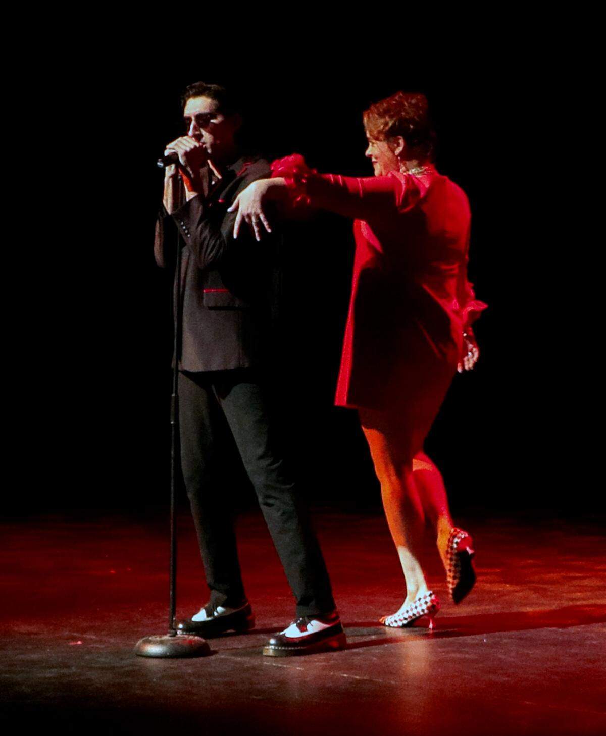 Danielle Patterson-Varner, CEO and executive producer of the Springer Opera House, joins Christian Becerra onstage as her performs “Pretty Woman” during the Springer’s 2026–27 season announcement celebration March 12, 2026.