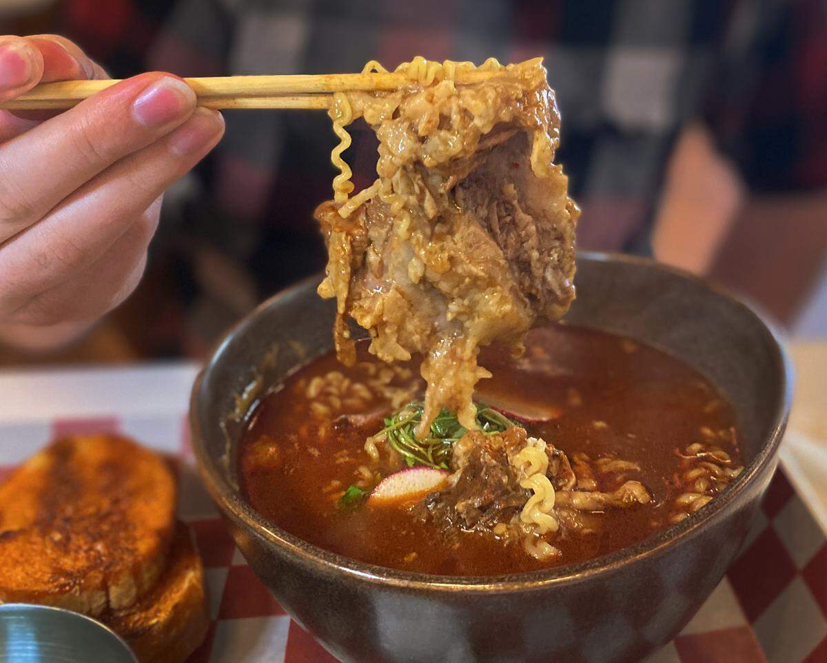 Ledger-Enquirer reporter Kelby Hutchison tried the Birria Ramen Soup at Me Encanta Modern Mexican Cuisine, 1231 Broadway, Suite 100, in downtown Columbus on Dec. 2, 2025.