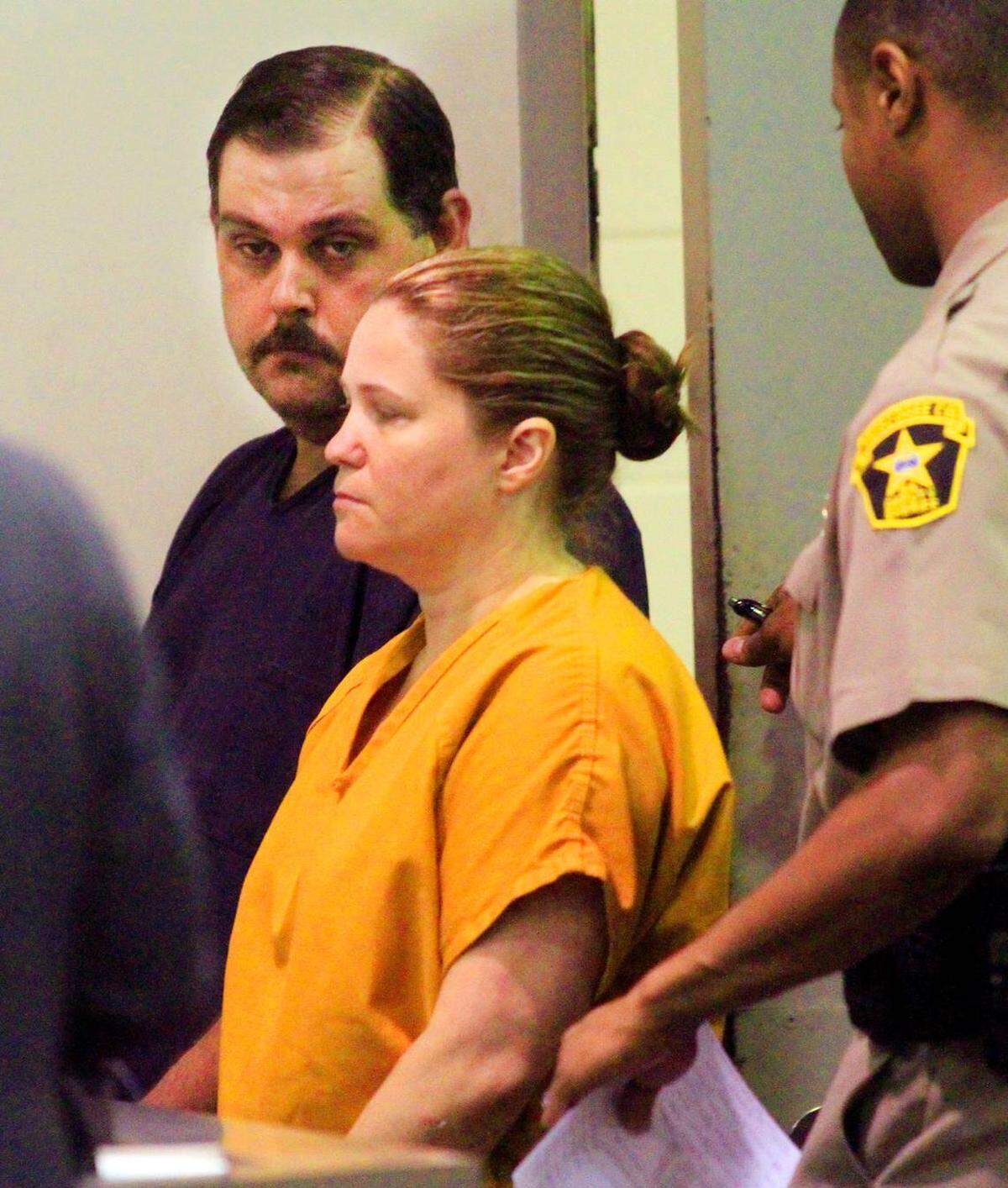 Rebecca Smith Haynie and Donald Keith Phillips appear in Columbus Recorder’s Court for a preliminary hearing in June 2014.
