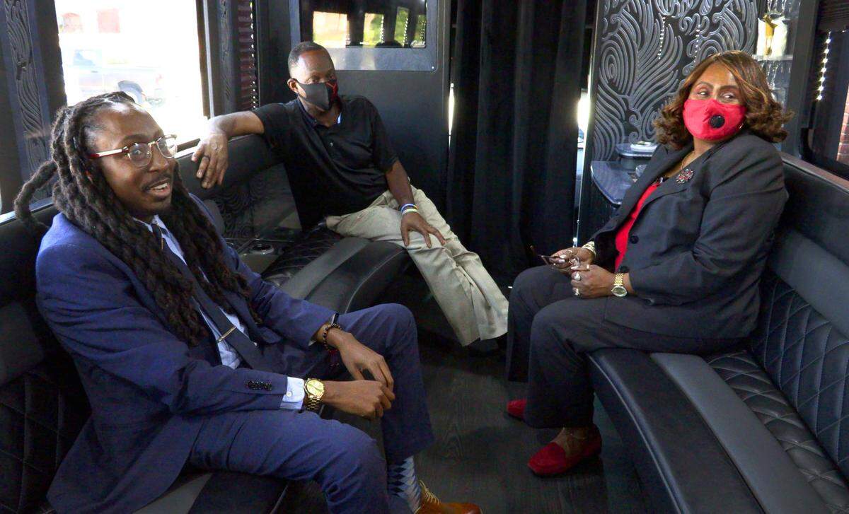 The Elite Party Bus is a family venture operated by Columbus attorney Ralston Jarrett, left, and his parents Ralston Jarrett Sr. and Reebe Jarrett.
