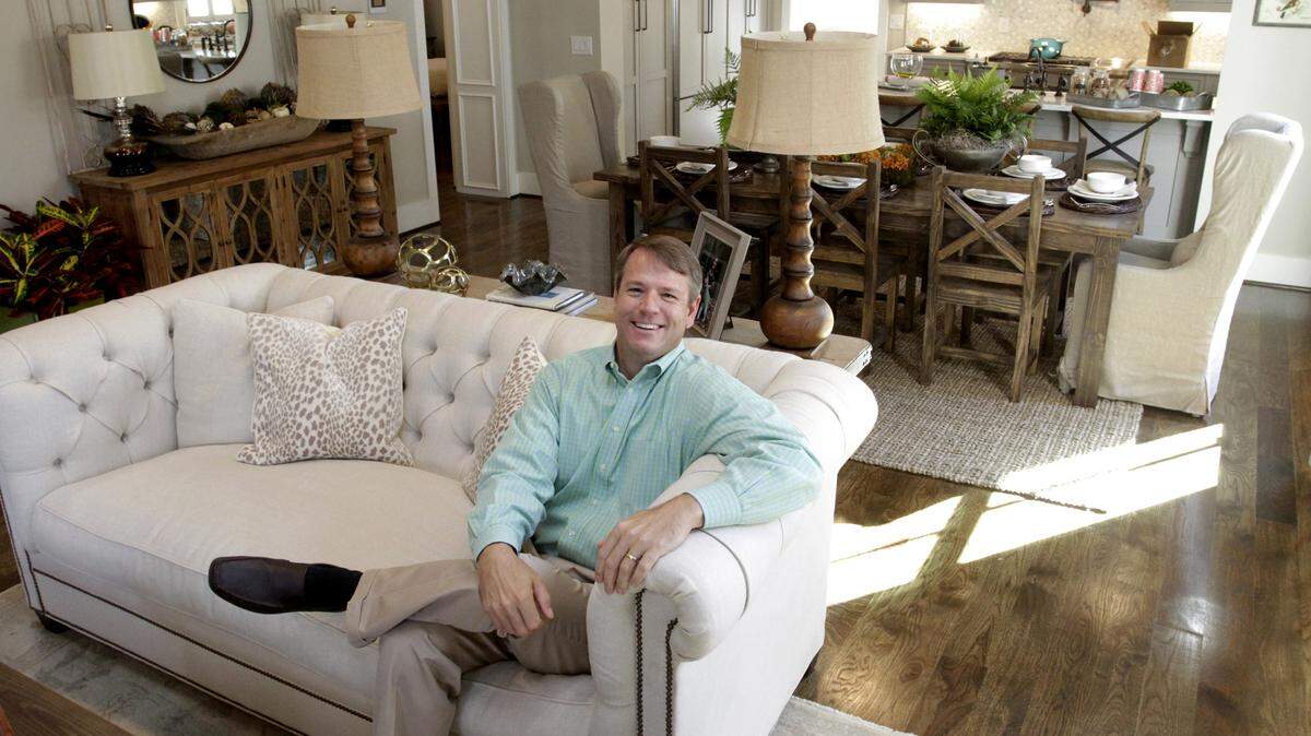 ROBIN TRIMARCHI/rtrimarchi@ledger-enquirer.comHomebuilder Chris Jones, president of CPJ Custom Homes, sits in one of his new single-family homes at Old Town. Jones' company, which is a certified Southern Living builder, is one of three building teams at the new north Columbus development.