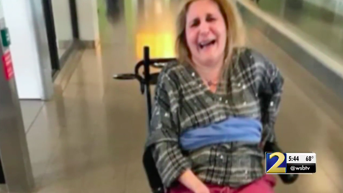 Nathan Saliagas says his mother, who has multiple sclerosis, was forcibly tied to a wheelchair with a dirty blanket by a Delta employee.. The airline says the woman was tied with blankets, but disputes other parts of the story.