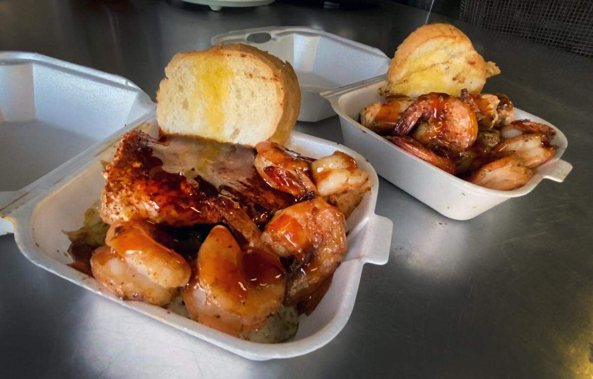 Jerome Lawson, the owner of Twist Skillit food truck in Columbus, Georgia, prepared a dish that included shrimp, salmon, and vegetables. 10/13/2021
