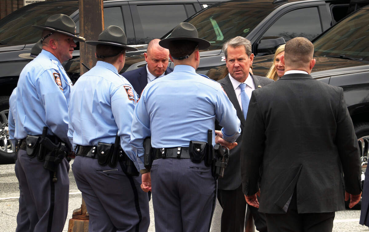 Georgia Gov. Brian Kemp arrives Monday morning at First Baptist Church in downtown Columbus, Georgia for the memorial service for Georgia Rep. Richard Smith. 02/05/2024