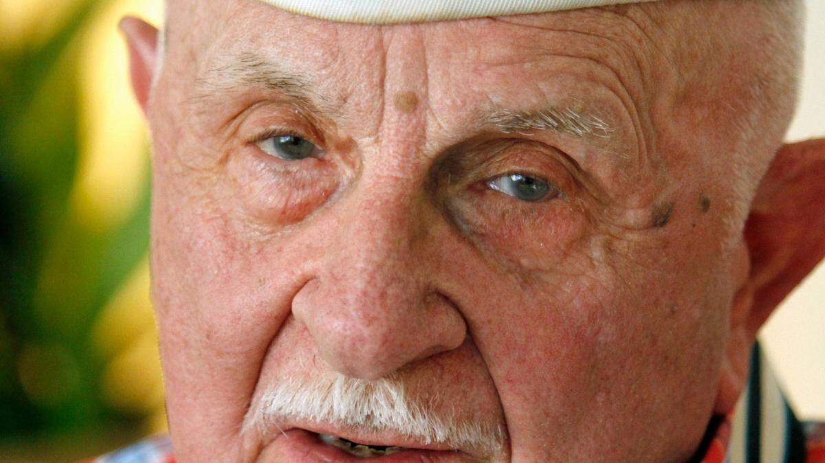 Seen here in 2014, Dixie Harris was one of 17 remaining World War II veterans in Georgia who survived the Japanese attack on Pearl Harbor on Dec. 7, 1941.