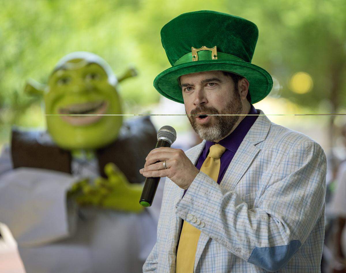 Stephen Scott, right, son of Strut the Hooch founder Steve Scott, traveled from his home in Tacoma, Washington, to participate in the May 2, 2026, parade in downtown Columbus, wearing the iconic costume his late father had worn as “Captain Hooch.”