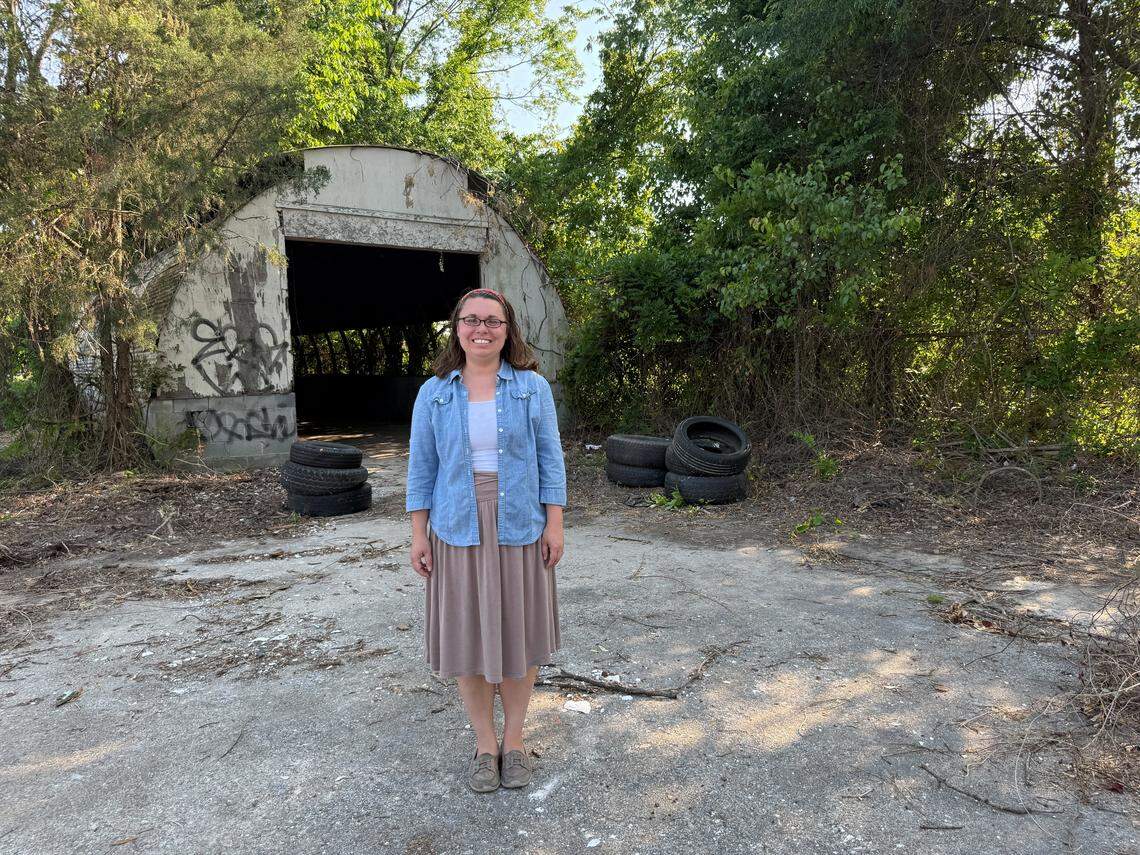 Kristin Andris, founder and president of the Living Mosaic Collective, stands April 22, 2026, at the Warm Springs Road site in Columbus where the group hopes to turn the vacant property into a community garden.