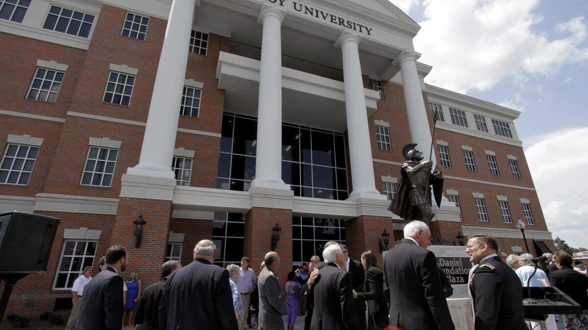 Troy University faculty, staff, alumni and dignitaries gather July 11, 2015, for the dedication of the new Phenix City campus on Third Avenue.