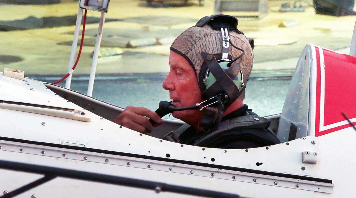 Champion aerobatic stunt pilot Marty Flournoy prepares to take off from the Columbus Airport in his Pitts Special aerobatic biplane. 