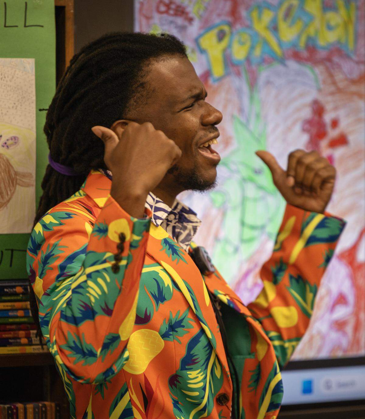 Author C.G. Esperanza speaks with students May 8, 2026, at Allen Elementary School in Columbus.