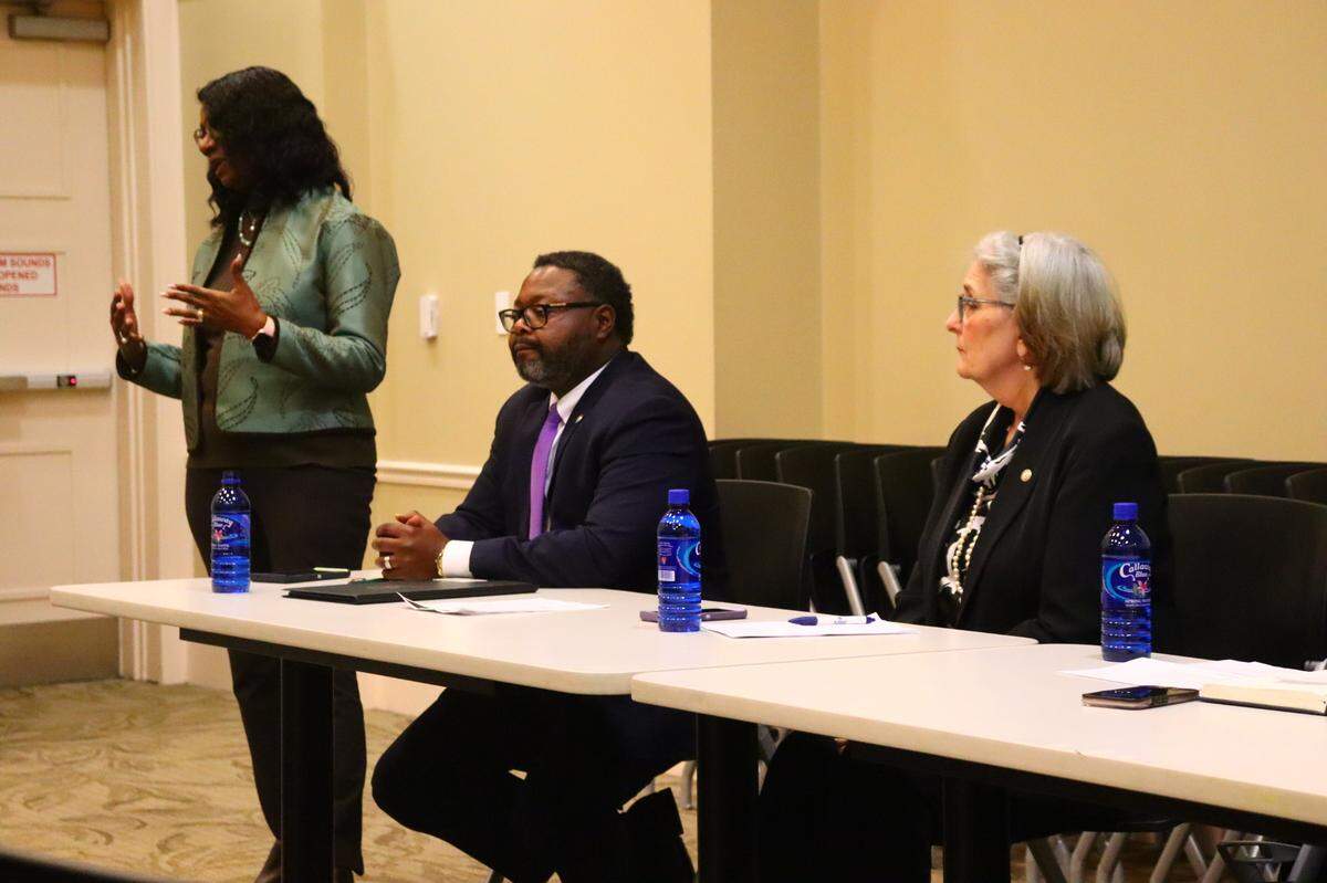 Representative Carolyn Hugley (D-141), Representative Teddy Reese (D-140), and Representative Debbie Buckner (D-137) listen to constituents during a town hall at the Columbus Public Library on January 3, 2024.