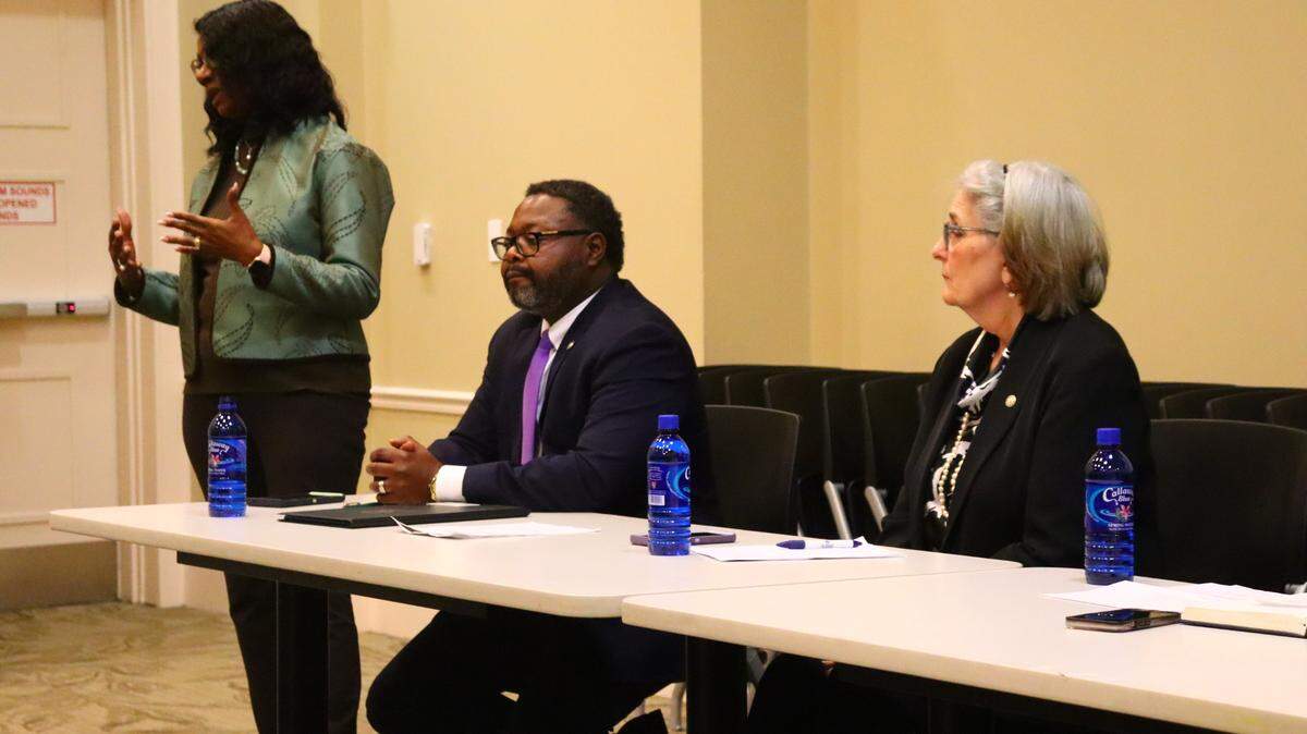 Representative Carolyn Hugley (D-141), Representative Teddy Reese (D-140), and Representative Debbie Buckner (D-137) listen to constituents during a town hall at the Columbus Public Library on January 3, 2024.