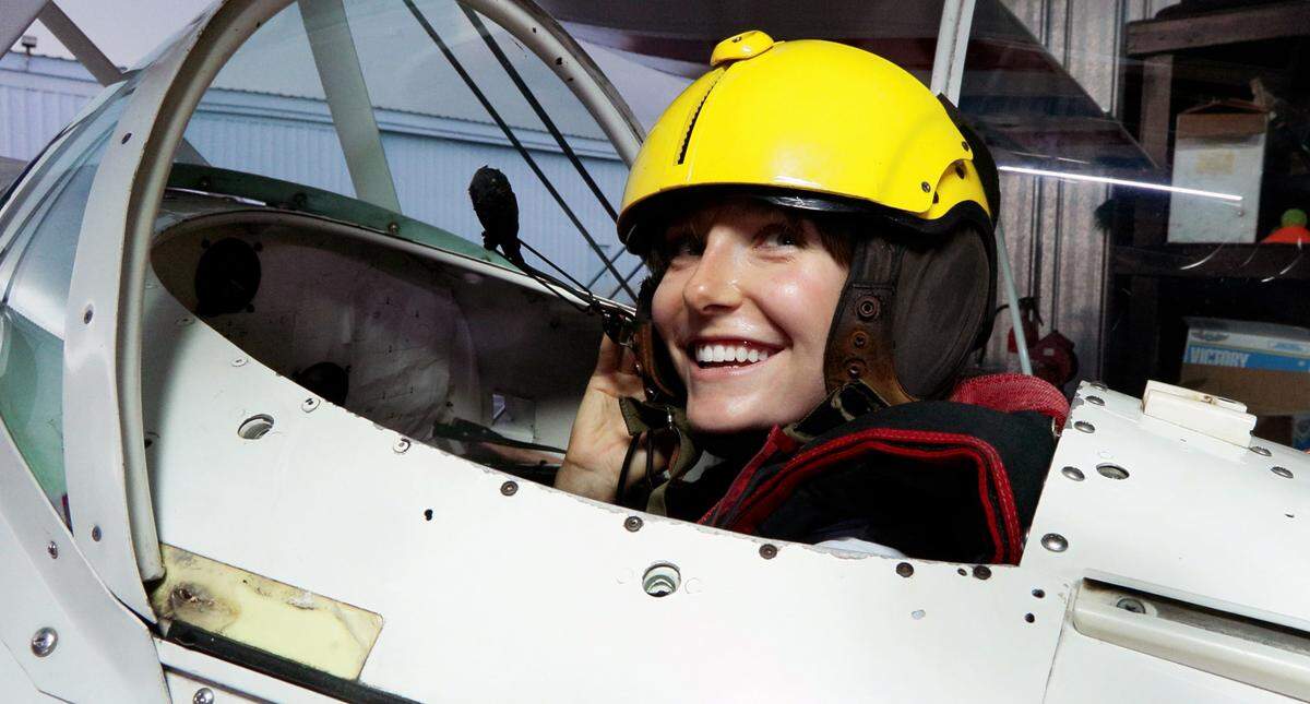 Grace McClung, a reporting intern at the Ledger-Enquirer in Columbus, Georgia, recently flew with Champion aerobatic stunt pilot Marty Flournoy in his Pitts Special aerobatic biplane. 