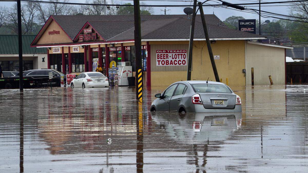 Flooding in downtown LaGrange. A day after a tornado struck Troup County, storms continued to roll through the area.