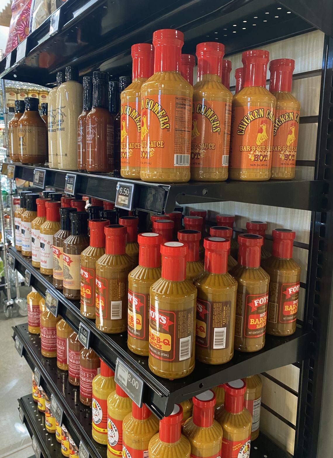 Green Island Grocery, pictured Dec. 12, 2025, at 6801 River Road in Columbus is now open and offers a variety of barbecue sauces.