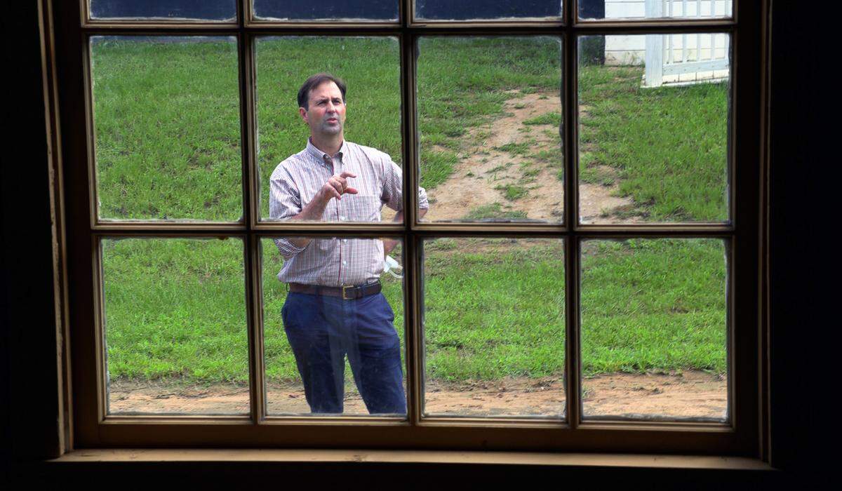 Julian Singer, executive director of Historic Westville, gives a tour recently. 09/02/2021