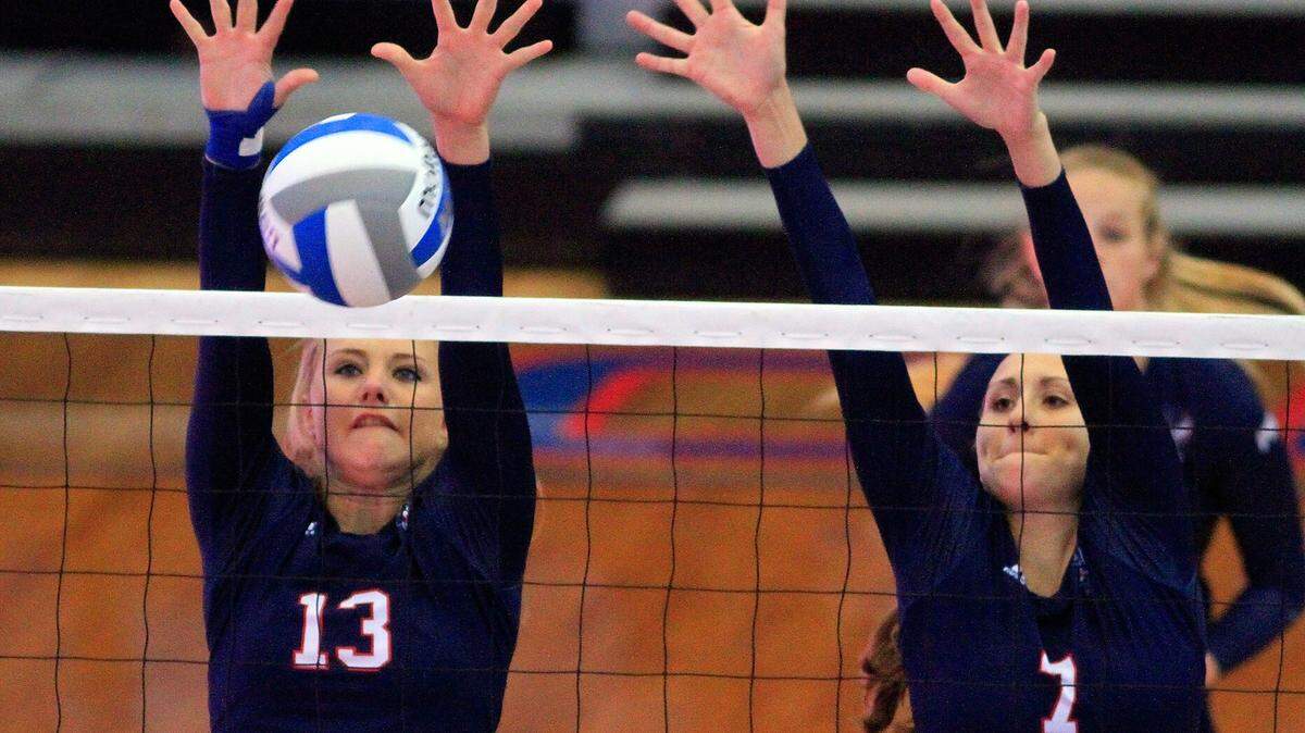 MIKE HASKEY/ mhaskey@ledger-enquirer.comCSU volleyball player Megan Frame tries to block the ball Sept. 7, 2013, during a match between CSU and Limestone College.