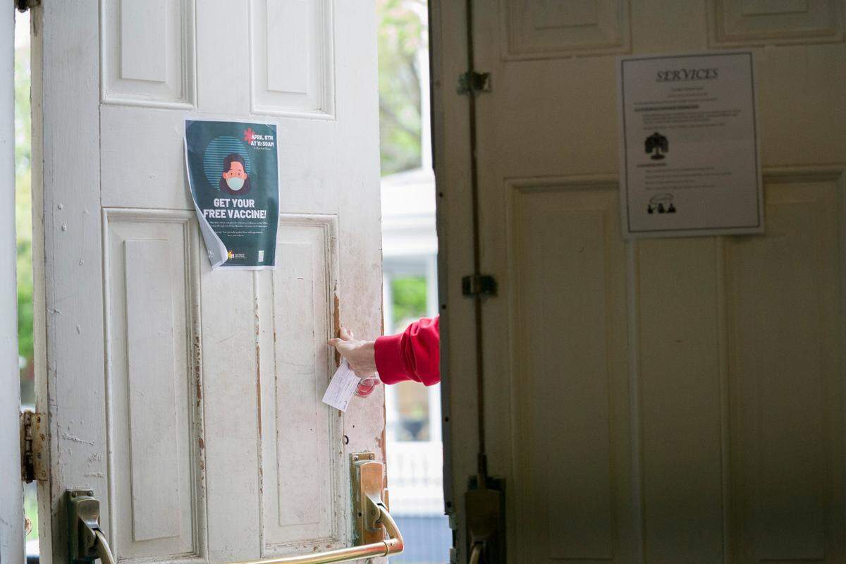 A man leaves Safehouse Ministries after receiving his COVID-19 vaccination on Friday, April 9, 2021 in Columbus, Ga.