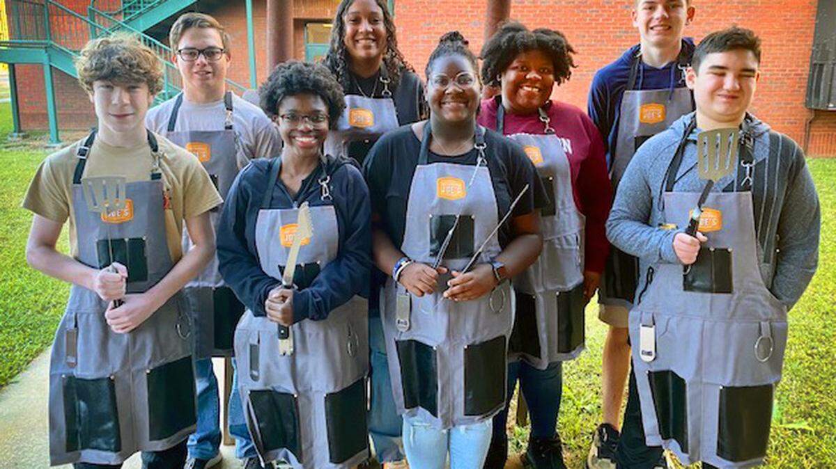 Competing in the Future Pitmaster Competition are Harris County High School students, front row (left to right): Tristan Johannes, Zaria Hunt, Rachel Willis, Brandon Butler, Ciara Thebaud (not shown); Back row (left to right): Pierce Smith, Isabella Rachel, Jayla Moss, and Jackson Phillips