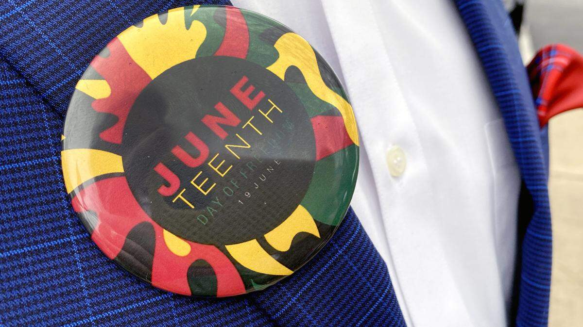 A Charlotte company has been sued by six former Black employees over a racist Juneteenth text posted on a workplace message group in 2021.