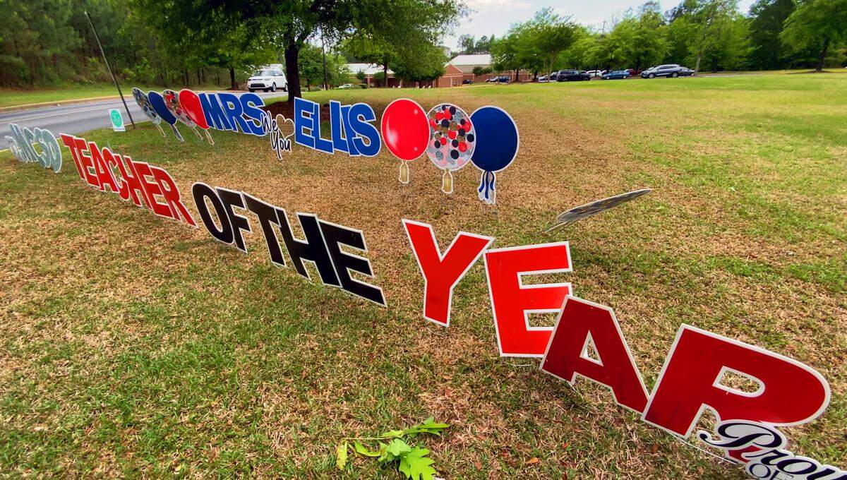 A sign outside Veterans Memorial Middle School in Columbus celebrates the selection of Vanessa Ellis, a teacher at the school, as tthe 2022 Muscogee County School District Teacher of the Year. 05/06/2022